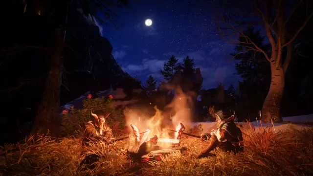 Two Flameborn resting beside a campfire at night